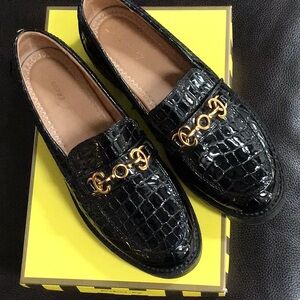 Women’s black croc loafer.
